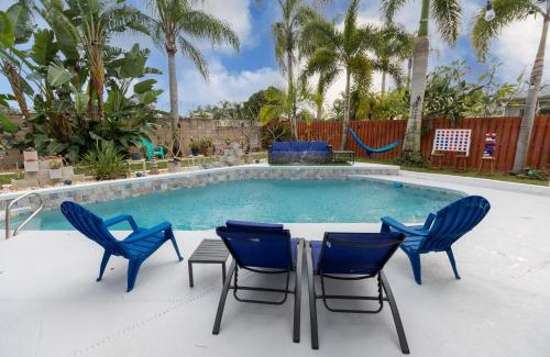 Tropic House | Gorgeous Urban Oasis withHot Tub, HEATED POOL and Private Movie Theater home