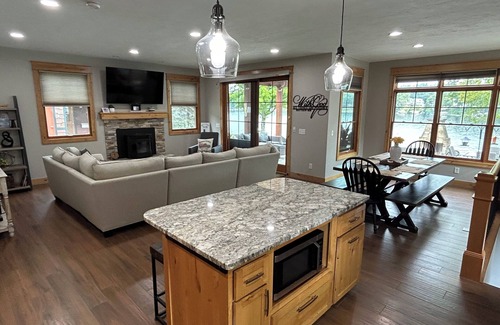 Newaygo House | Gorgeous waterfront 4-BR home with adorable Tiny House and pickleball court!