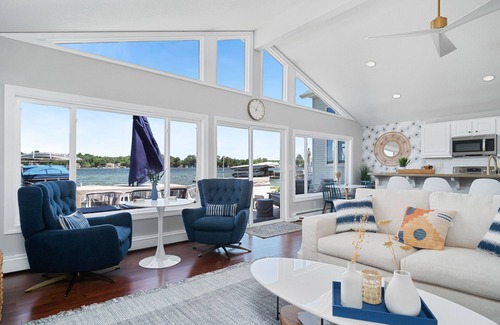 Angola House | Gorgeous Waterfront Home on Crooked Lake w/Hot Tub, AC, Dock, Swim on 2nd Basin