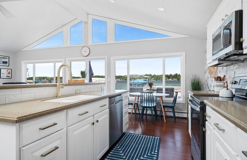 Angola House | Gorgeous Waterfront Home on Crooked Lake w/Hot Tub, AC, Dock, Swim on 2nd Basin