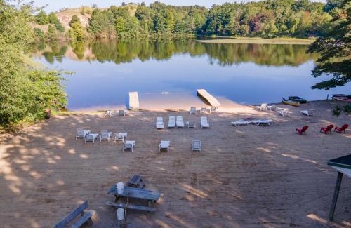 Saugatuck House | Goshorn 18 - Located in Goshorn Lake Resort - Shared pool - Lake access