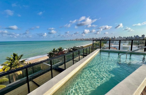 Jardim Oceania Apartment | Gourmet Studio with Sea-Facing Pool