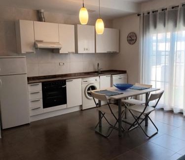 Sant Jaume d'Enveja Apartment | Gran terraza con piscina