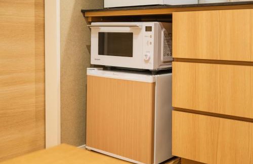 Susakiuramachi Apartment | GRAND BASE Hakatamon