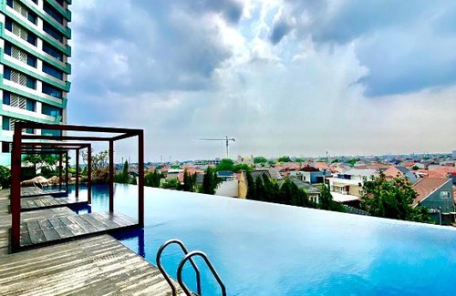 Pekayon Jaya Apartment | Grand Kamala Lagoon Type Studio Emerald North By Happy Room's