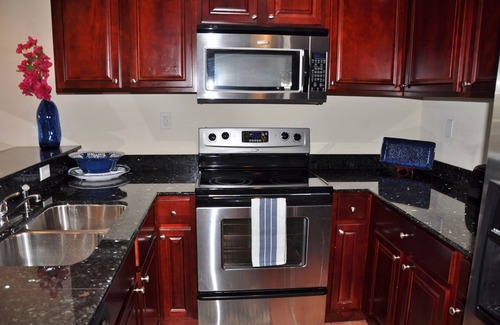Estate Enighed Condo | Grande Bay Resort - Indigo Blue Luxury 1BR Condo Beachfront!