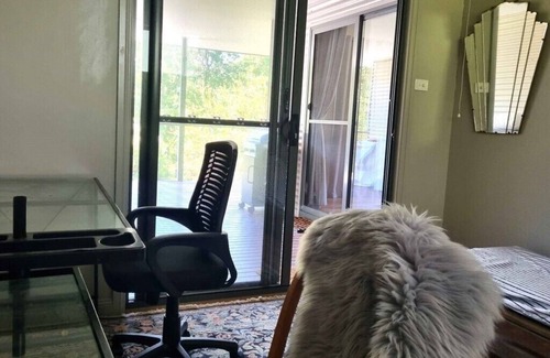 Valla Apartment | Granny flat with office and private verandah in garden setting 7 mins to beach