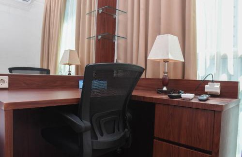 East Jakarta Apartment | Great Location and Comfy 1BR Apartment at Woodland Park Residence By Travelio