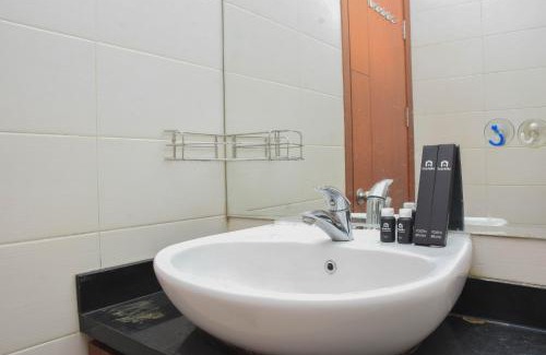 East Jakarta Apartment | Great Location and Comfy 1BR Apartment at Woodland Park Residence By Travelio