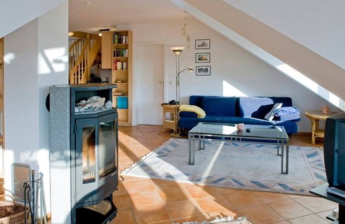 Kuehlungsborn Apartment | Great top floor apartment with loggia and wood-burning stove - only 40 m to the beach!