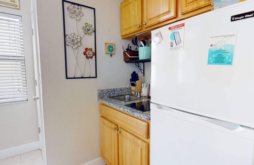 Redington Beach Condo | Great Value! Steps to Beach - Large Patio Area ~ Heated Pool ~ Free Parking - Ground Floor Condo