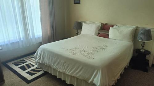Mahikeng Apartment | Green leaves