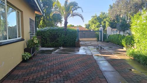Mahikeng Apartment | Green leaves