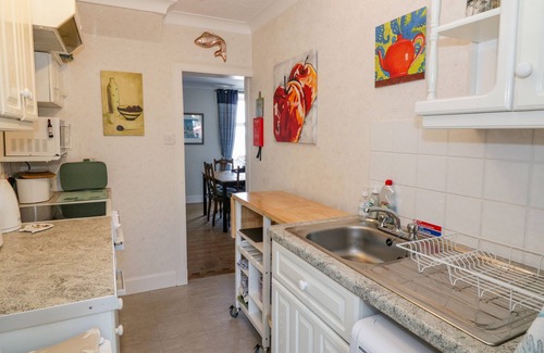 Port William House | GREYSTONES, character holiday cottage, with open fire in Port William