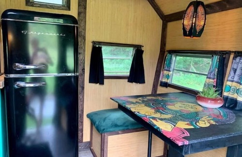 Monticello RV Rental | Groovy Vintage RV In the Woods