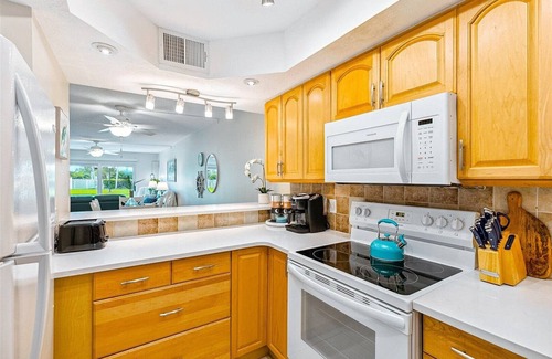 Port Canaveral Condo | Ground Floor Family Beach Escape – Pool, Patio & Walk to the Pier!
