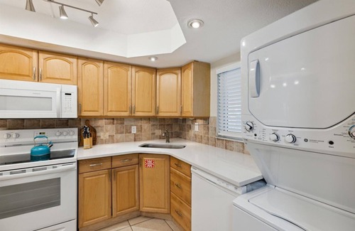 Port Canaveral Condo | Ground Floor Family Beach Escape – Pool, Patio & Walk to the Pier!