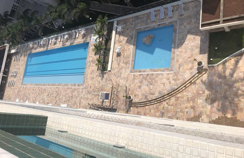 Peninsula Apartment | Guaruja: A Lookout to the Open Sea, seeing Ilhabela and Alcatrazes.