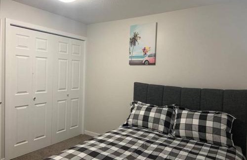 Regina Apartment | Guest Suite with Queen Bed -Home Away from Home