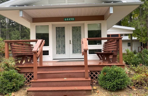 Shorewood-Tower Hills-Harbert Cottage | Guests have access to 200 ft of private beach & sand dunes on Lake Michigan.