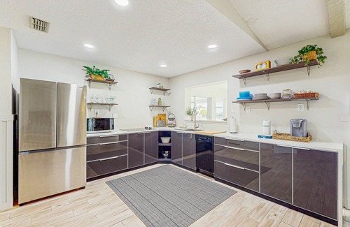 Spring Hill House | Gulf coast getaway with dock, dolphins, sunset views, family friendly and WD
