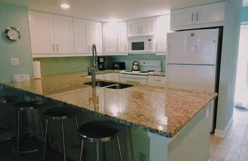 Palm Island House | Gulf Front on an island,kayaks,tennis/pickleball SUP, 1 pet POOL IS CLOSED