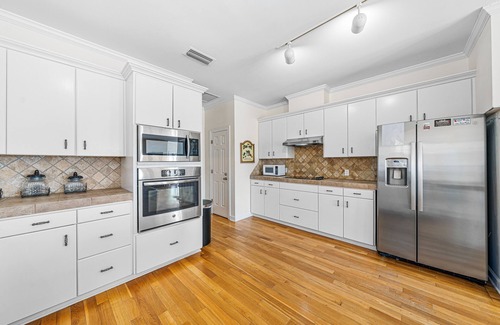 Audubon Place House | Gulfview home with outdoor shower, large deck, and internet