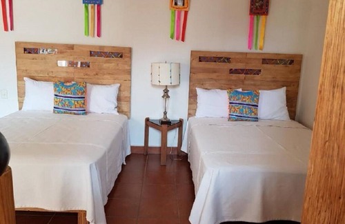 Luis Jimenez Figueroa Bed & Breakfast | Habitación Retablos en Casa Los Arquitos B&B
