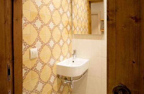 Santa Pau House | Habitacions Plaça Major