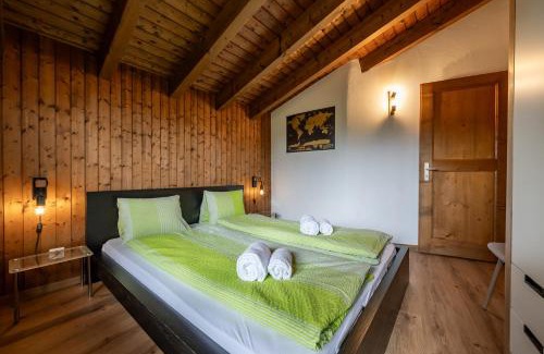 Laax Apartment | Half chalet with garden & balcony - 2' to Ski bus