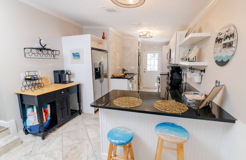 Crystal Beach Cottage | Happy Camper Cottage - Cozy Oasis with Outdoor Hot Tub - No Cleaning Fee