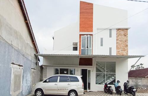 Patrang Hotel | Happy Family Homestay Jember Mitra RedDoorz