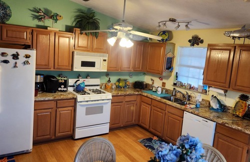 Long Key House | Happy "Key-z " canal-front home w/Tiki hut- RV storage available.