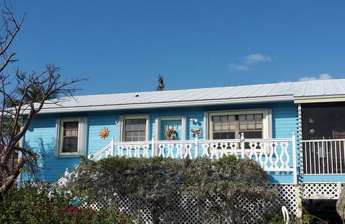 Long Key House | Happy "Key-z " canal-front home w/Tiki hut- RV storage available.
