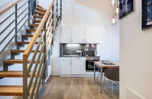 Wismar Apartment | Harbor residence with gallery bedroom, roof terrace and unique harbor view