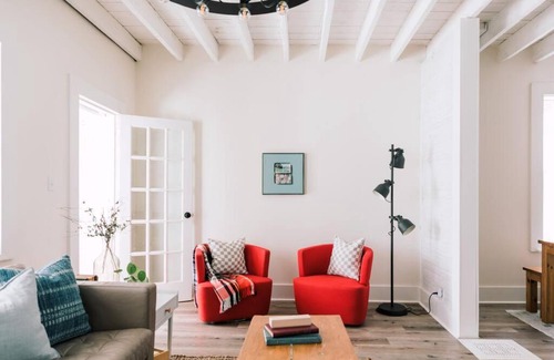 Prince Edward House | Harbour Main playful century home w private patio