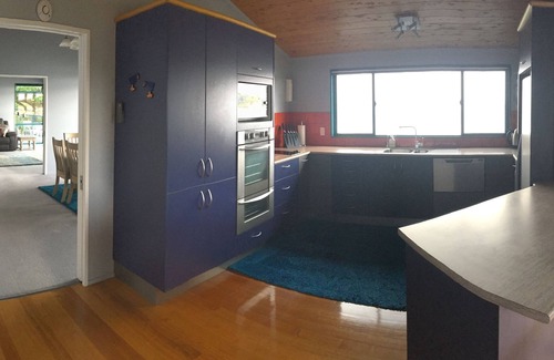 Onerahi Apartment | Harbour views from super spacious upstairs apartment. Fully equipped.