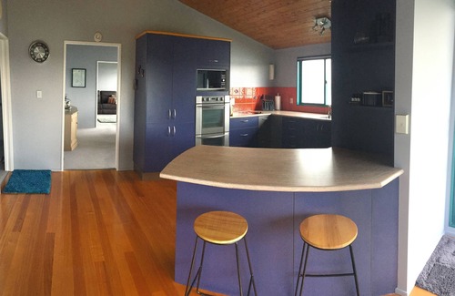Onerahi Apartment | Harbour views from super spacious upstairs apartment. Fully equipped.