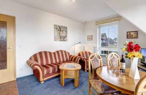 Loddin Apartment | Haus Ostseeglück - Ferienwohnung Morgensonne mit Gemeinschaftssauna