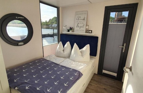 Schleswig Boat Rental | Hausboot Fjord Dory mit Biosauna in Schleswig