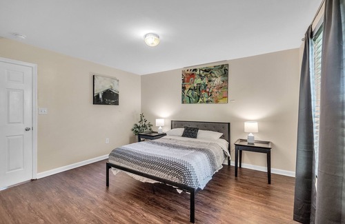 Martinsburg House | Have The Best Stay At Our Modern Art Gallery Home 3 Bedroom Home by Redawning