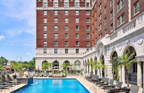 Central West End Hotel | Haven of Relaxation! Pets Allowed! With Parking, Pool, and Cinema!