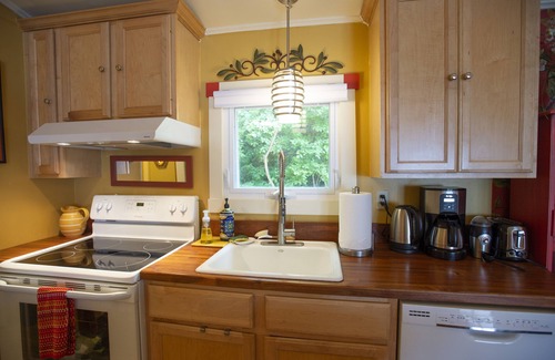 Town of Ledyard House | Heck-Of-A-Deck Lakehouse with Sunsets, and Kayaks, too!