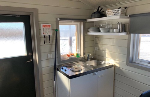 Hvolsvollur Hotel | Hellisholar Cottages