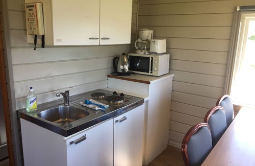 Hvolsvollur Hotel | Hellisholar Cottages