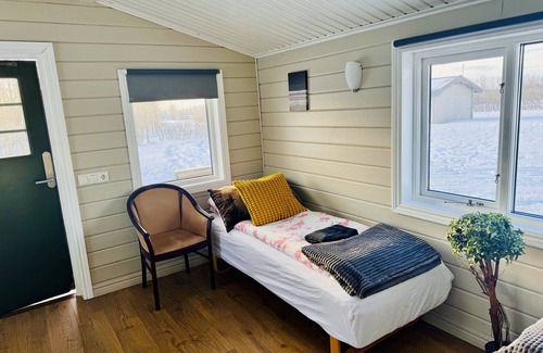 Hvolsvollur Hotel | Hellisholar Cottages