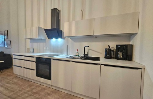 Suderneuland I Apartment | Herzlich Willkommen in der Exklusiven Ferienwohnung Teefabrik Zentral in Norden