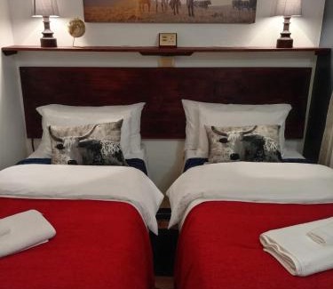 Strand House | Hibiscus Cottage