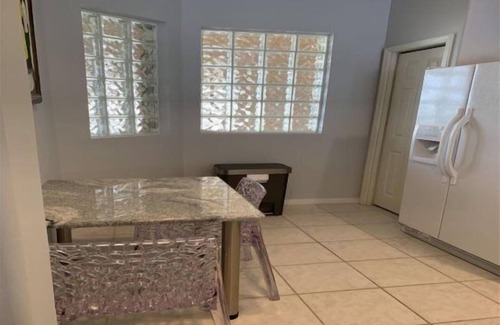 Tropical Cove Condo | Hibiscus Flower at Lexington CC Golf Village