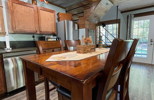 Lupton City Cabin | Hidden Cove Cabin at The Pines: Hand Crafted Charm in Peaceful Wooded Cove
